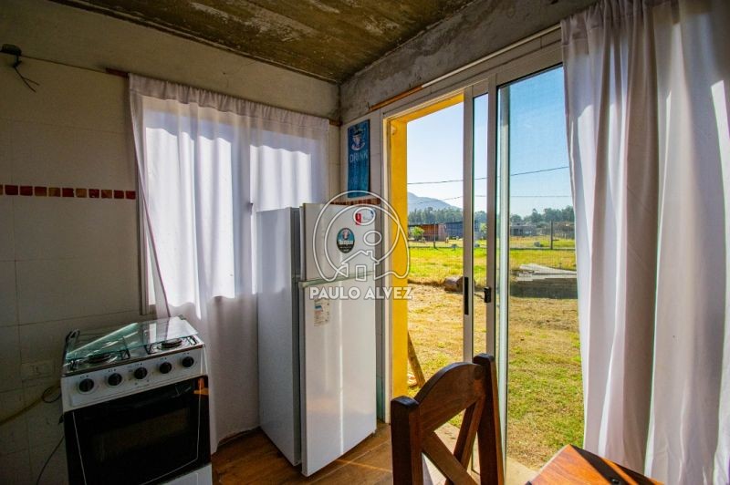 Cocina con salida al jardín